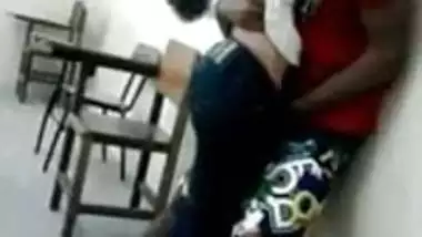 Young India College girl kissing in classroom