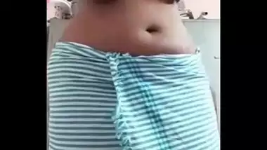 Malayali aunty wearing a thorthumundu and showing big boobs