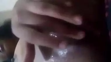 Porn video of the excited Desi enchantress masturbating wet vagina