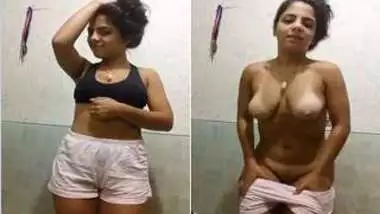 Indian teen goes to the shower room to expose XXX vagina and shake ass